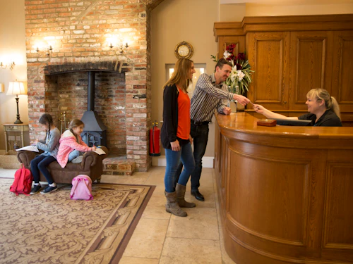 Family checking in for a Paultons Breaks hotel stay